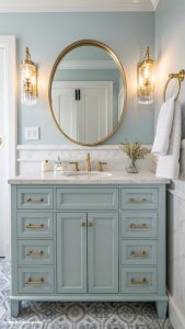 blue bathroom Light blue vanity with gold hardware
